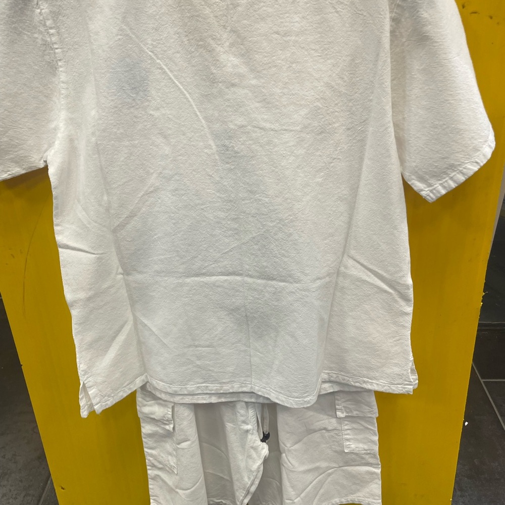 Pure white linen kids resort-wear set.